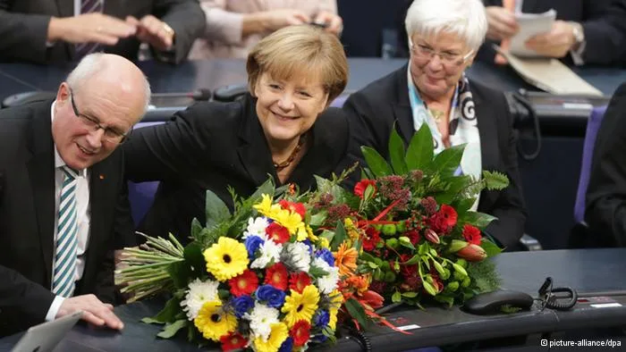 German Chancellor Merkel smiles during a CDU election campaign rally in Stralsund